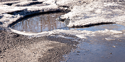 Potholes could occur during heavy rain