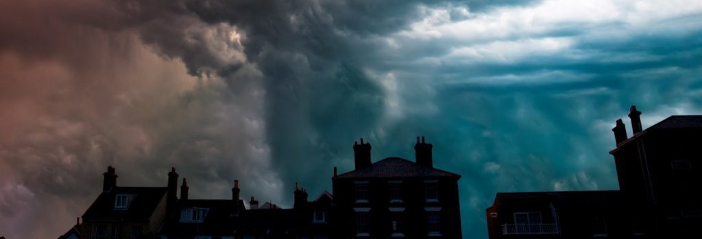 Storm Clouds Over Houses